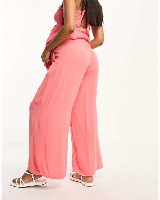 Vero Moda Vero Moda - Zwangerschapskleding - Gesmokte Broek Met Wijde Pijpen in het Pink