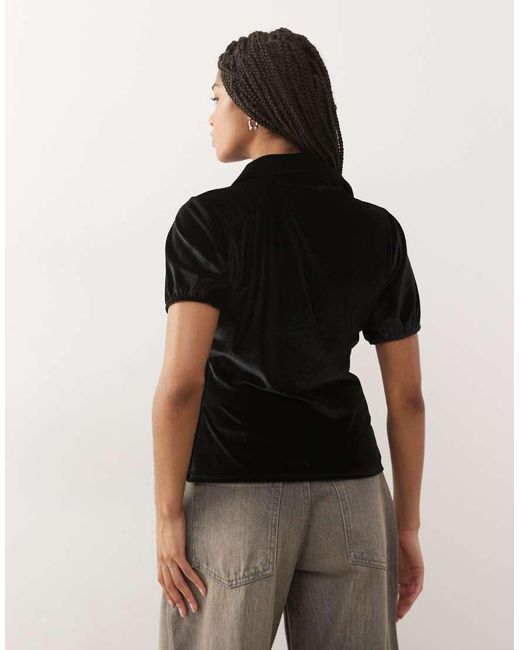 Reclaimed Vintage Black Neat Fit Velvet Shirt With Asymmetric Buttons And Puff Sleeve