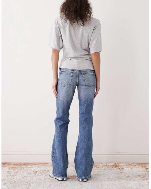 Weekday Distressed Bootcut Flared Jeans in het Blue
