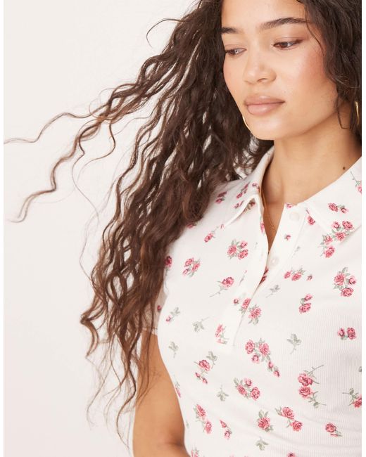 ASOS White – t-shirt mit kurzer knopfleiste, polokragen und blümchenmuster, kombiteil