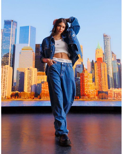 Jeans dritti stile anni '90 lavaggio medio di Calvin Klein in Blue