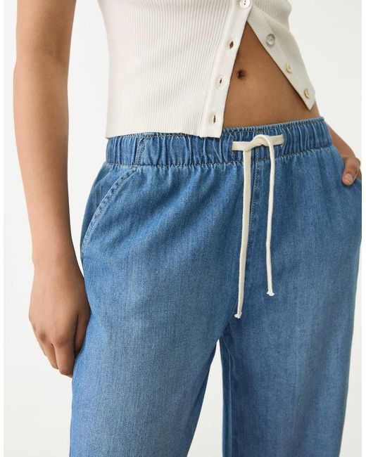 Jeans A Fondo Ampio Medio Con Coulisse di Stradivarius in Blue