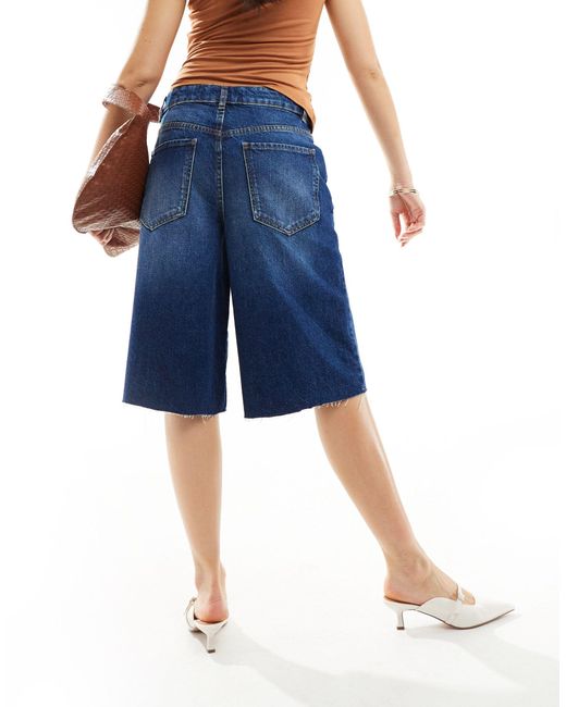 Short en jean long coupe baggy - délavage foncé ASOS en coloris Blue