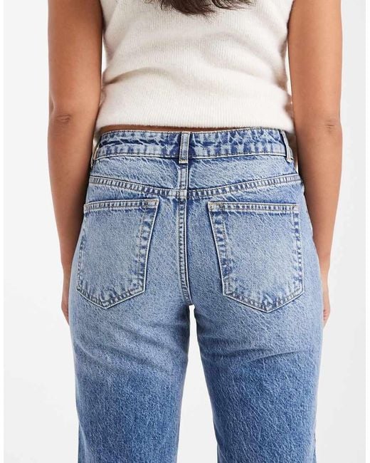 Vaqueros De Campana Azules De Talle Medio Con Lavado Medio De ASOS de color Blue