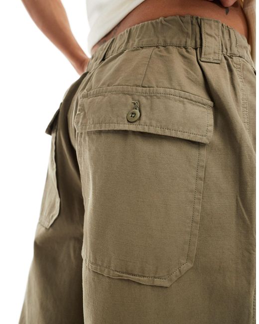 Buck - pantaloni verdi di AllSaints in Natural da Uomo