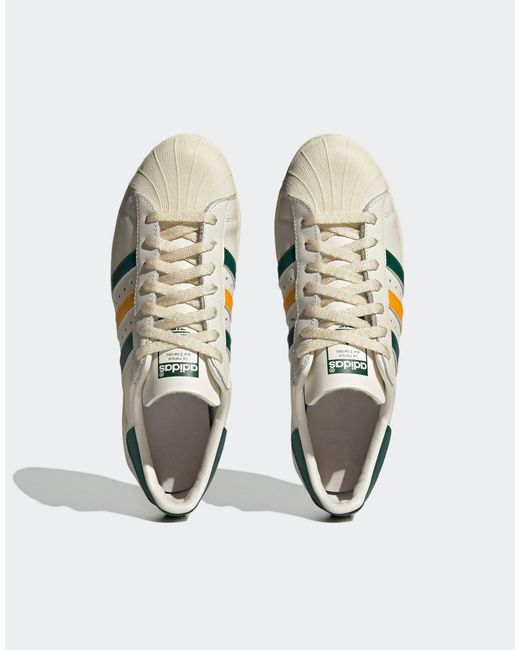 Superstar - sneakers bianche con strisce gialle e verdi da Uomo di adidas  Originals in Metallizzato | Lyst