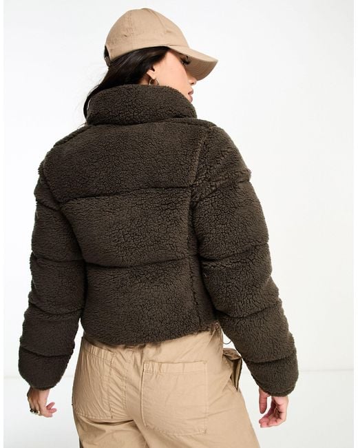 Exclusivité asos - puffect - veste courte en imitation peau Columbia en coloris Brown