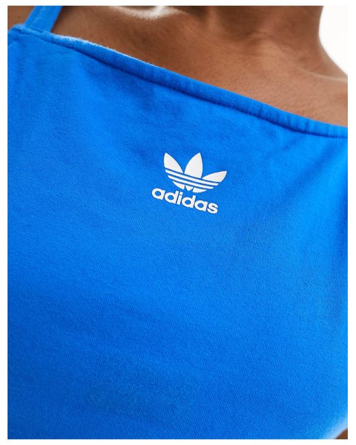 Camiseta corta azul pájaro sin mangas con tres rayas Adidas Originals de color Blue