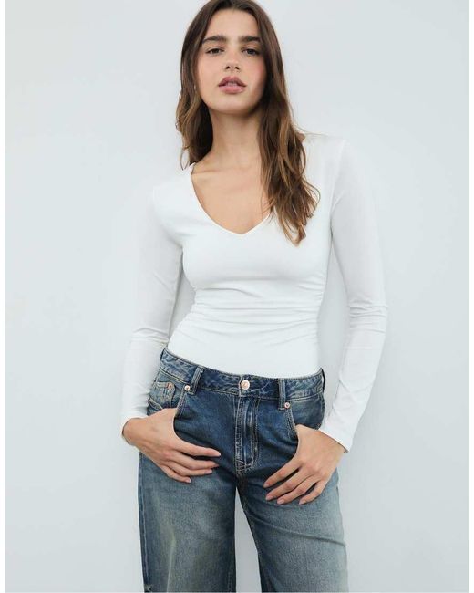 Stradivarius White Gathered Polyamide Bodysuit With V-neckline