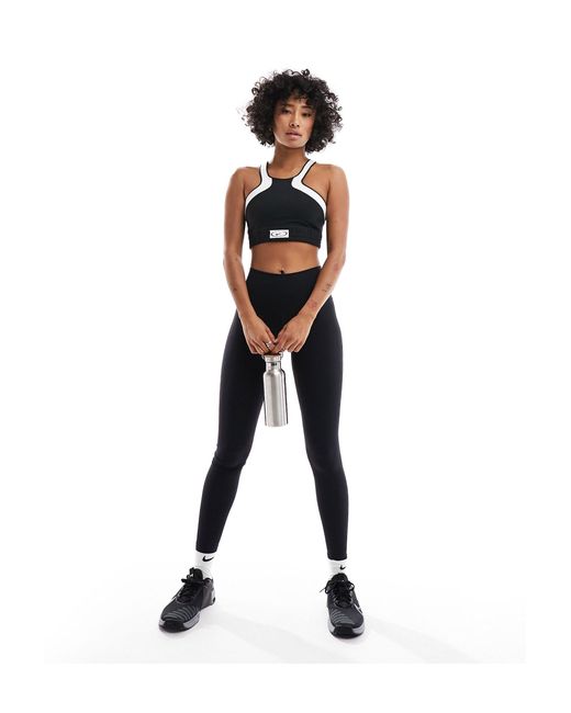 Nike Black Nike Dri-fit Road To Wellness Swoosh Wrap Sports Bra