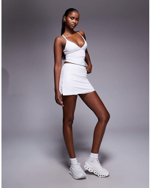 Gonna Stile Tennis Tecnica Per Padel Bianca Con Pantaloncini Integrati di 4505 in White