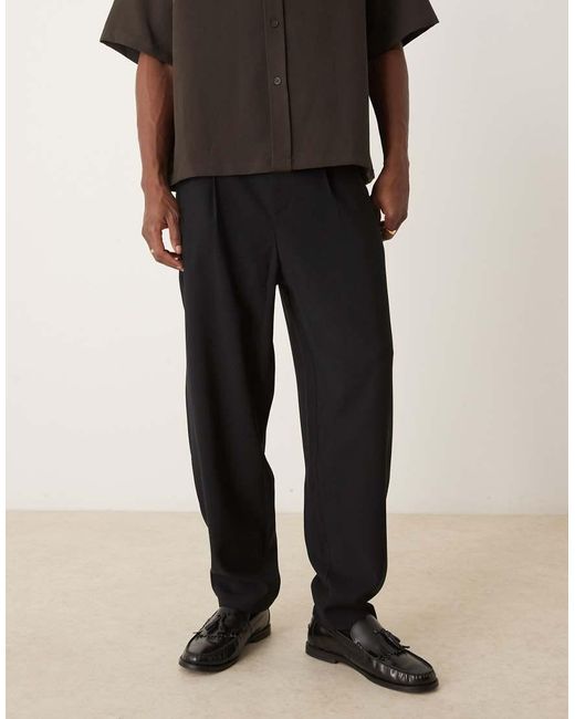 ASOS Nette Ruimvallende Broek in het Black voor heren
