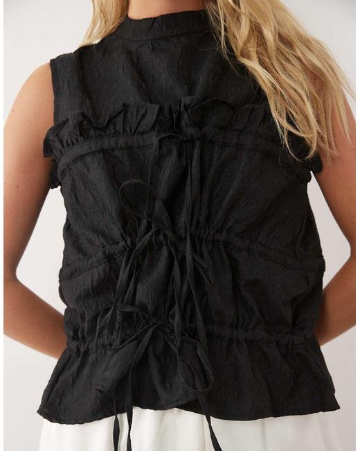 Ghospell Black Amina High Neck Sleeveless Drawstring Top