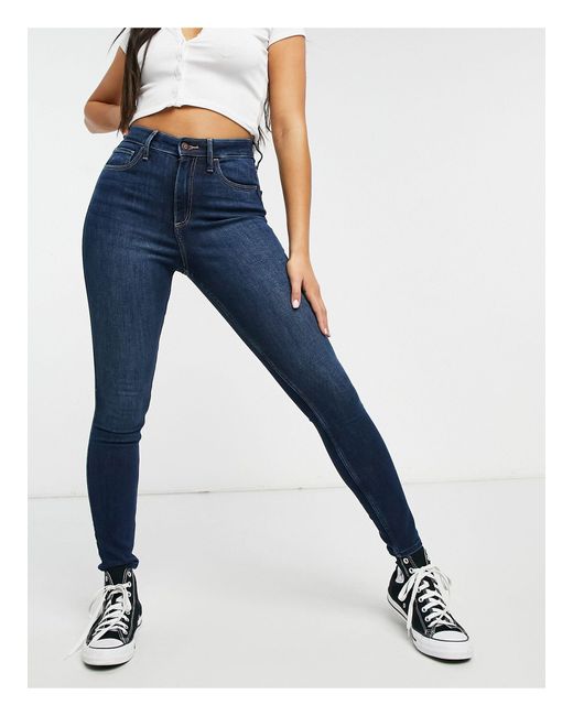 Jean skinny coupe curvy - délavé foncé Hollister en coloris Blue