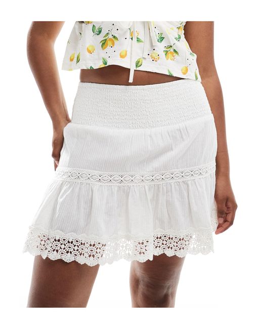 Ibiza - mini-jupe en dentelle mélangée - cassé Superdry en coloris White
