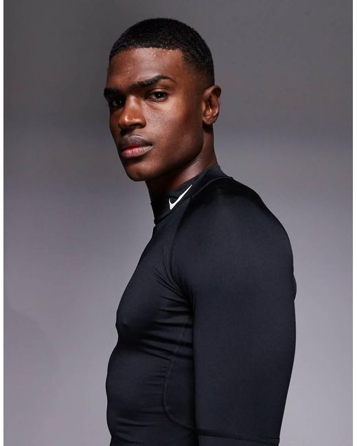 Nike Black Pro Dri-fit High Neck Long Sleeve Top for men