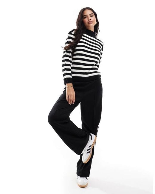 Black high neck oversized jumper hotsell