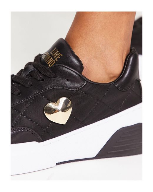 Love Moschino Gewatteerde Sneakers Met Gouden Hart in het Black