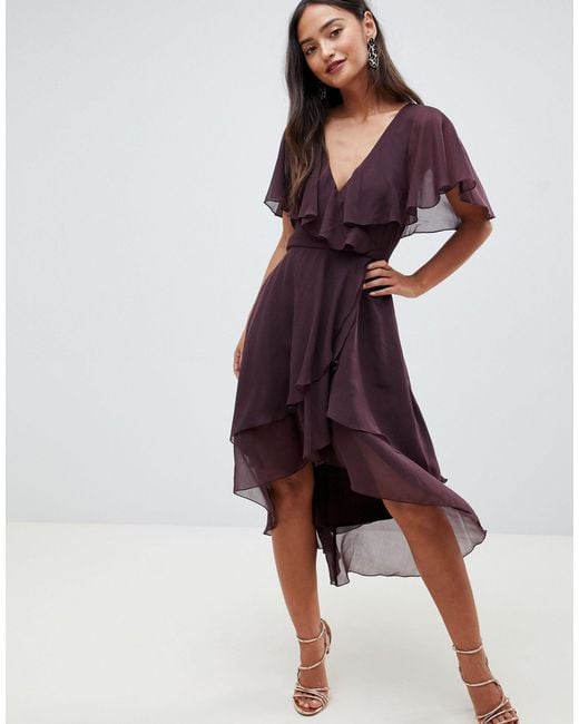 cape back dipped hem dress