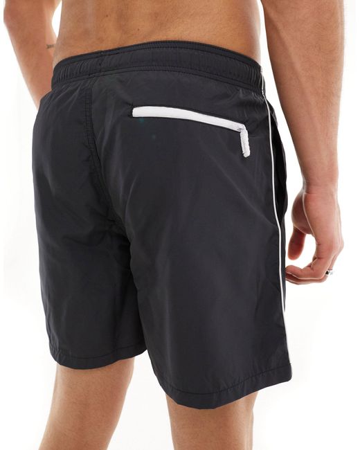 Pantaloncini da bagno lineari neri con logo e profili a contrasto di Armani Exchange in Black da Uomo