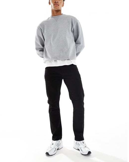 Vaqueros Negros De Corte Tapered 502 De Levi's de hombre de color White