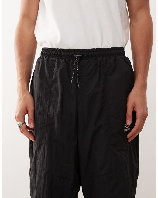 Umbro – locker geschnittene jogginghose mit reißverschluss in Blue für Herren