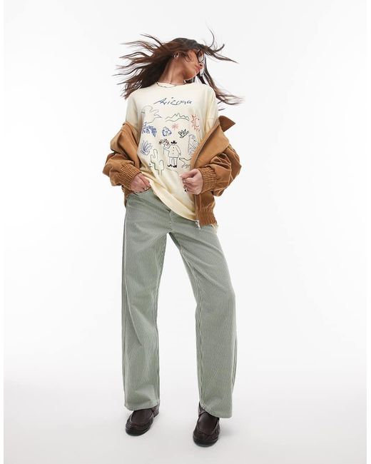 T-Shirt Oversize Color Latticello Con Stampa Ricamata “Arizona” di TOPSHOP in White