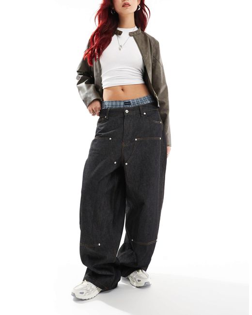 X008 - jean style skateur à genoux renforcés - brut délavé Collusion en coloris Black