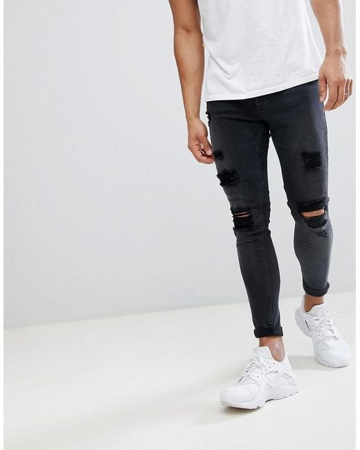Gym King Super Skinny Jeans In Black With Distressing for men
