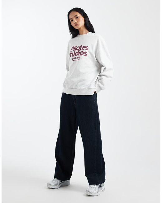 ASOS White Oversized Sweatshirt With Pilates Studio Graphic