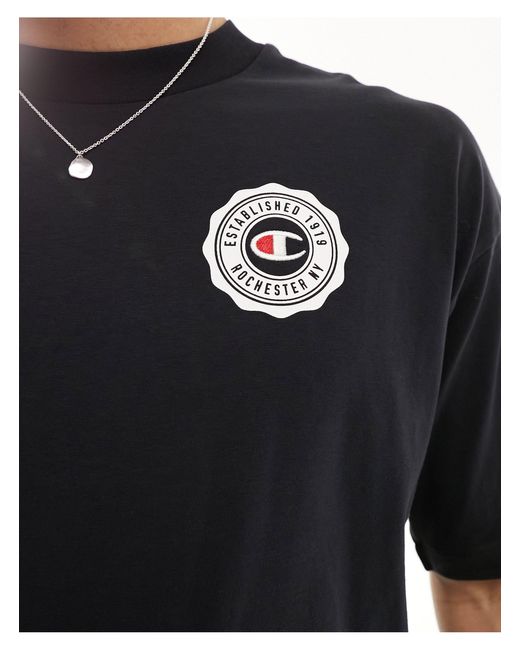 Camiseta negra con logo estampado en la espalda Champion de hombre de color Black