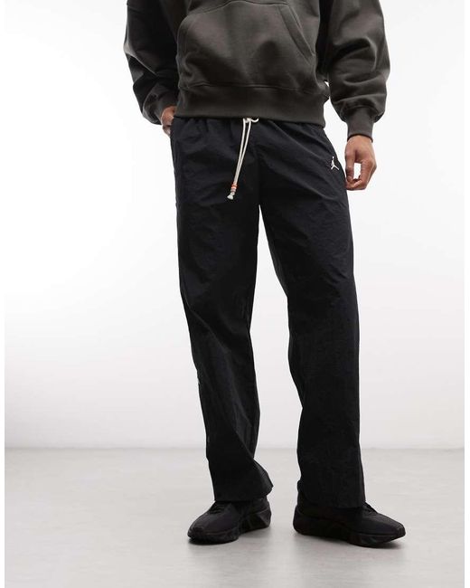 Nike Gray Brookyln Woven Trousers for men