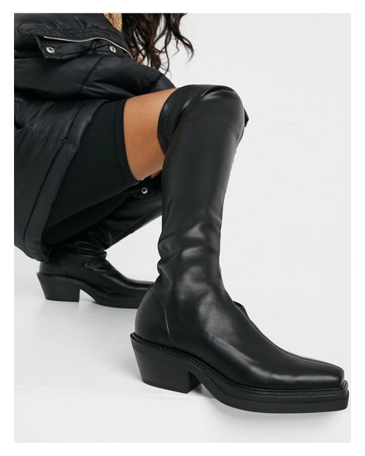 pull on stretch black boots