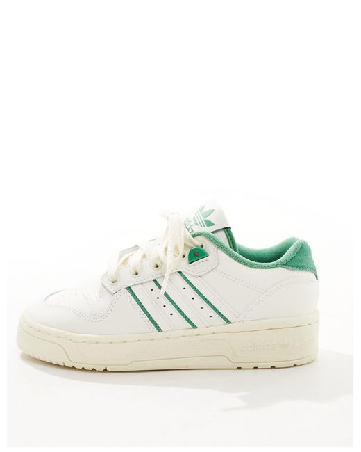 Rivalry - sneakers basse bianche e verdi di Adidas Originals in White
