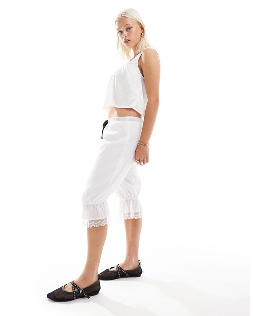 Labelrail White X Daisy Birchall Bow Detail Longline Bloomer Capri Trousers