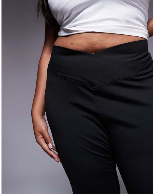 Pantalones De Campana Negros Moldeadores De Talle Alto Con Cinturilla Cruzada De Asos Design Curve ASOS de color Black