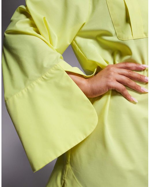 Robe chemise courte à rayures avec revers larges et poches oversize - jaune vif ASOS en coloris Yellow