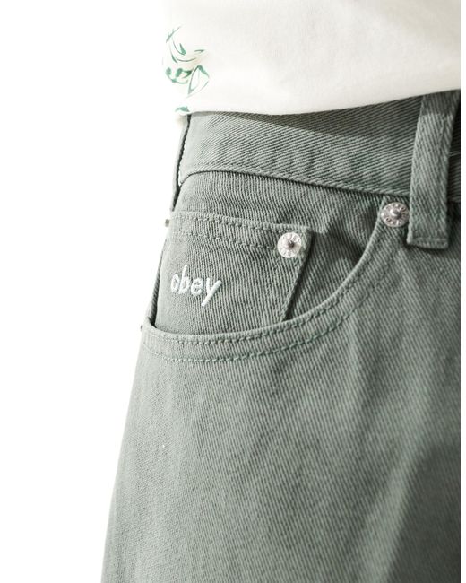 Pantaloncini di jeans ampi kaki di Obey in Green da Uomo