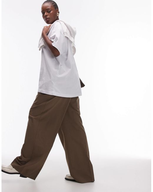 Curve - pantalon décontracté à taille nouée élastique Mango en coloris White