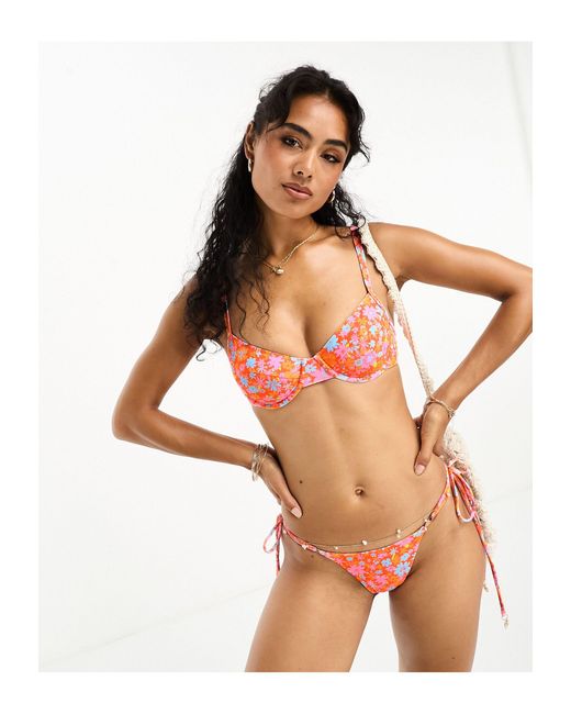 X hannah meloche & ava jules - perizoma del bikini con laccetti laterali a fiorellini di Kulani Kinis in Orange
