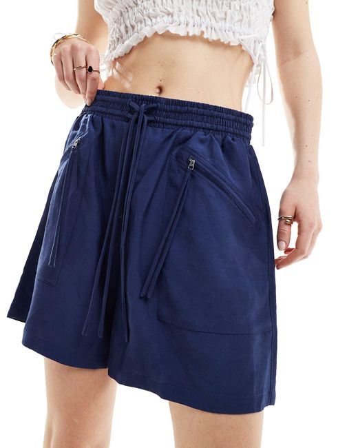 Pantalones cortos es con cintura elástica y bolsillos con cremallera & Other Stories de color Blue