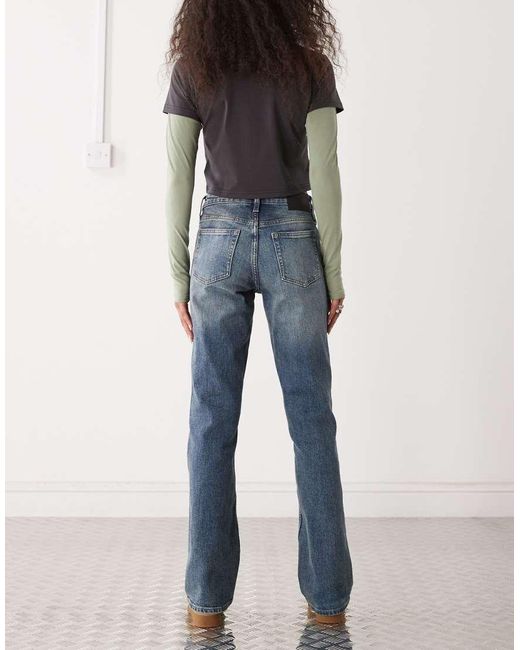 Vaqueros Azul Oscuro Deslucido De Corte Bootcut Acampanado Slim Tension De Weekday de color Blue