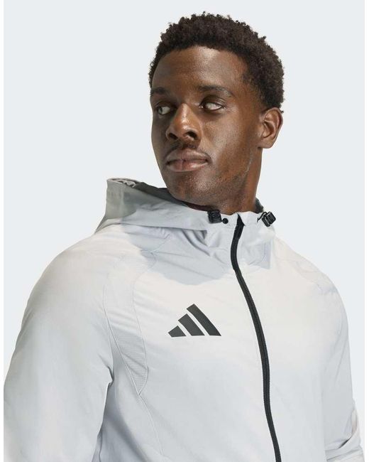Adidas Originals White Tiro Travel Windbreaker Jacket for men