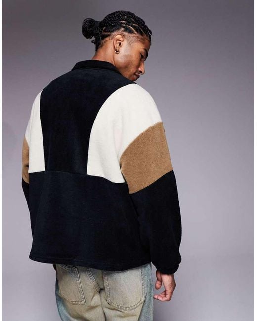 Sudadera Negra Extragrande Con Cremallera Corta, Cuello Alzado Y Diseño Color Block De Felpa De ASOS de hombre de color Blue