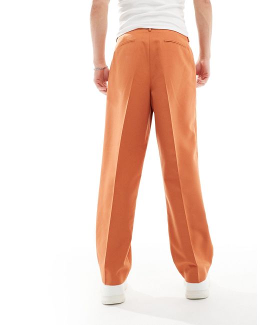 Pantaloni eleganti a fondo ampio arancioni di ASOS in White da Uomo