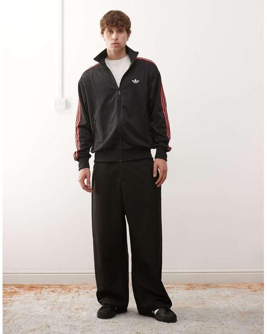 Adidas Originals Black Firebird Loose Pinstripes Track Top for men
