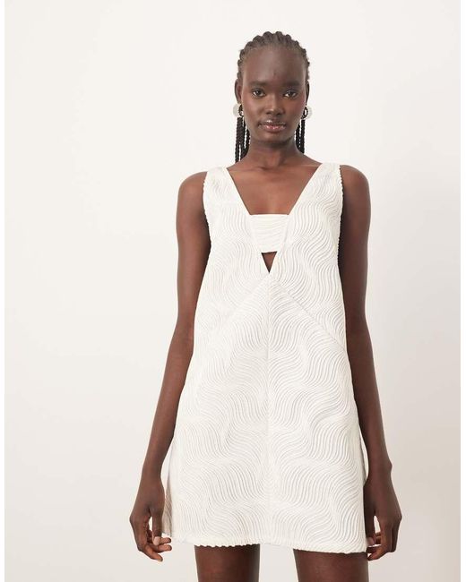 ARRANGE Natural Wave Textured Plunge Mini Dress