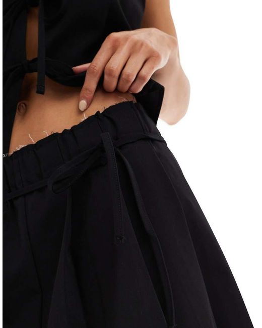 Pull&Bear Geplooide Mini Rok Met Strikdetail in het Black