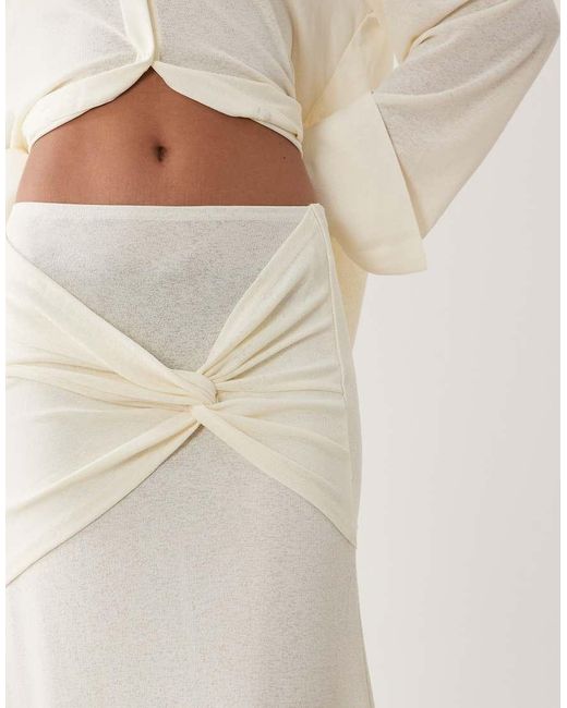 SNDY'S Natural Soft Fine Knit Semi Sheer Ruched Twist Front Detail Maxi Skirt