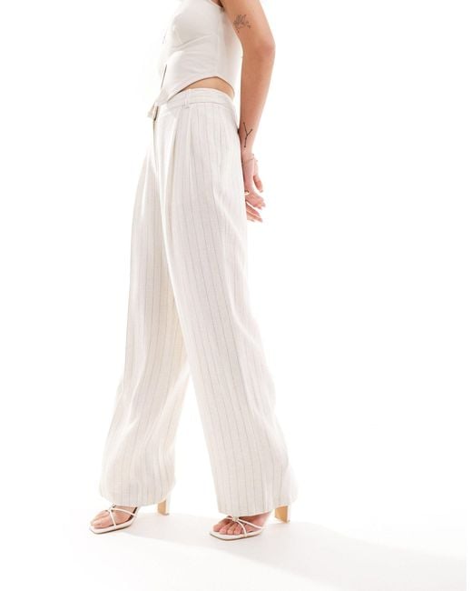 Pantaloni a fondo ampio effetto lino con motivo a righe di New Look in White